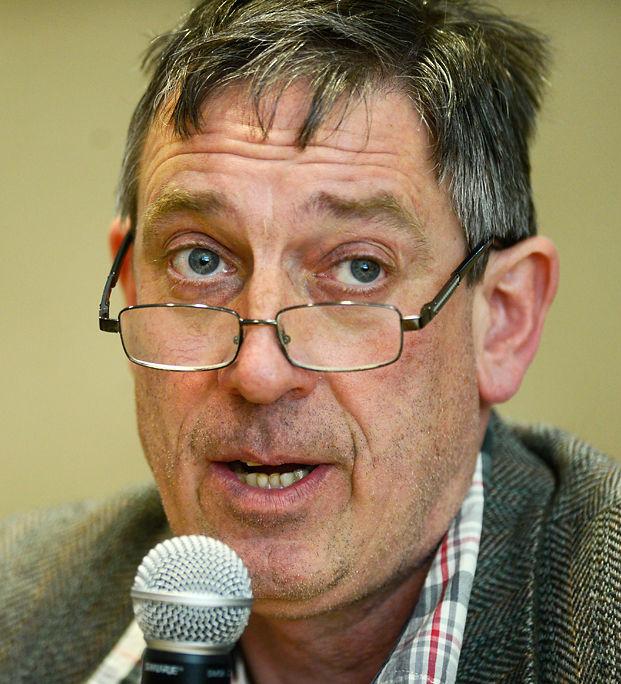 Ian Thomas speaks during a candidate forum
